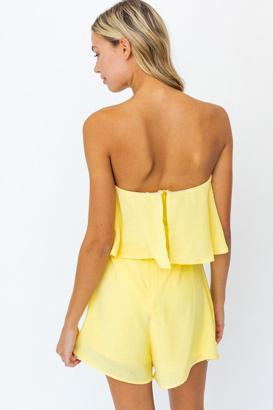 Candy sleeveless romper with bow detail and layer